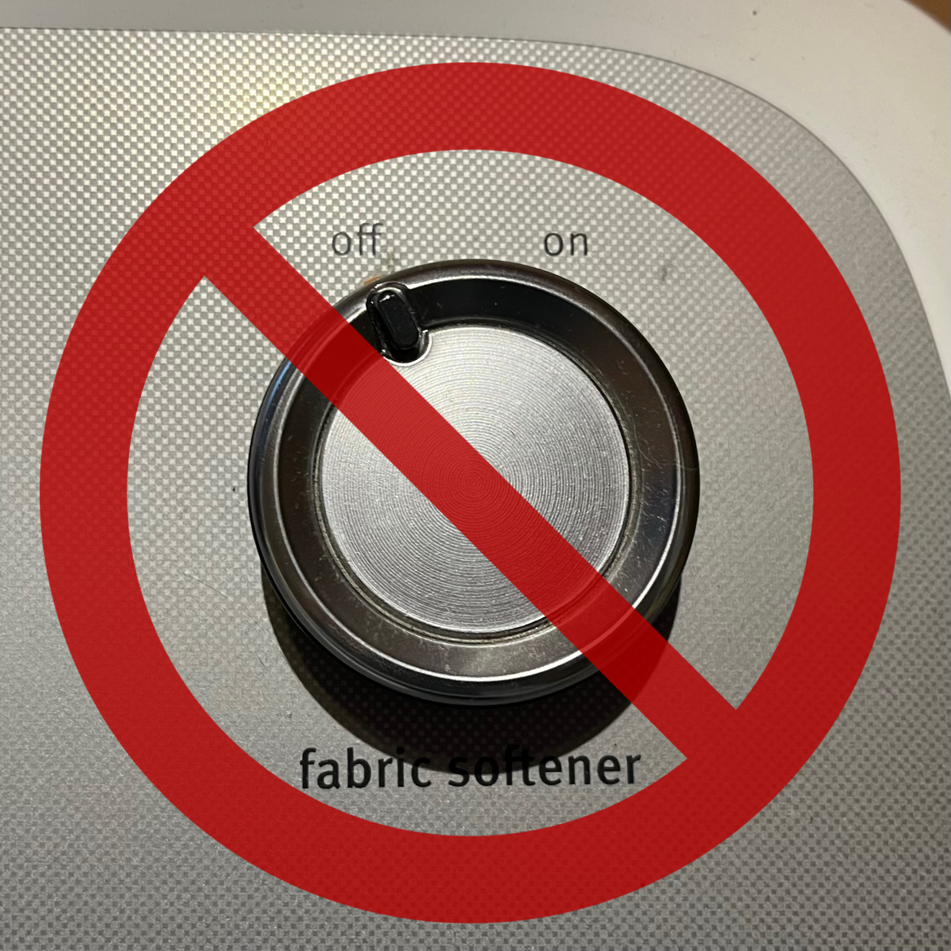 Fabric softener dial crossed out with a red no symbol